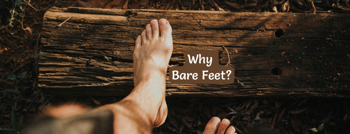 Bare feet on wood walking path