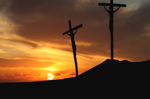 Sometimes the cross is real banner... Three crosses on a hill at sunset