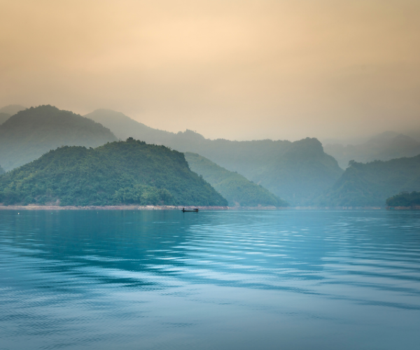 meditations with an ink pen image of a calm sea and mountains